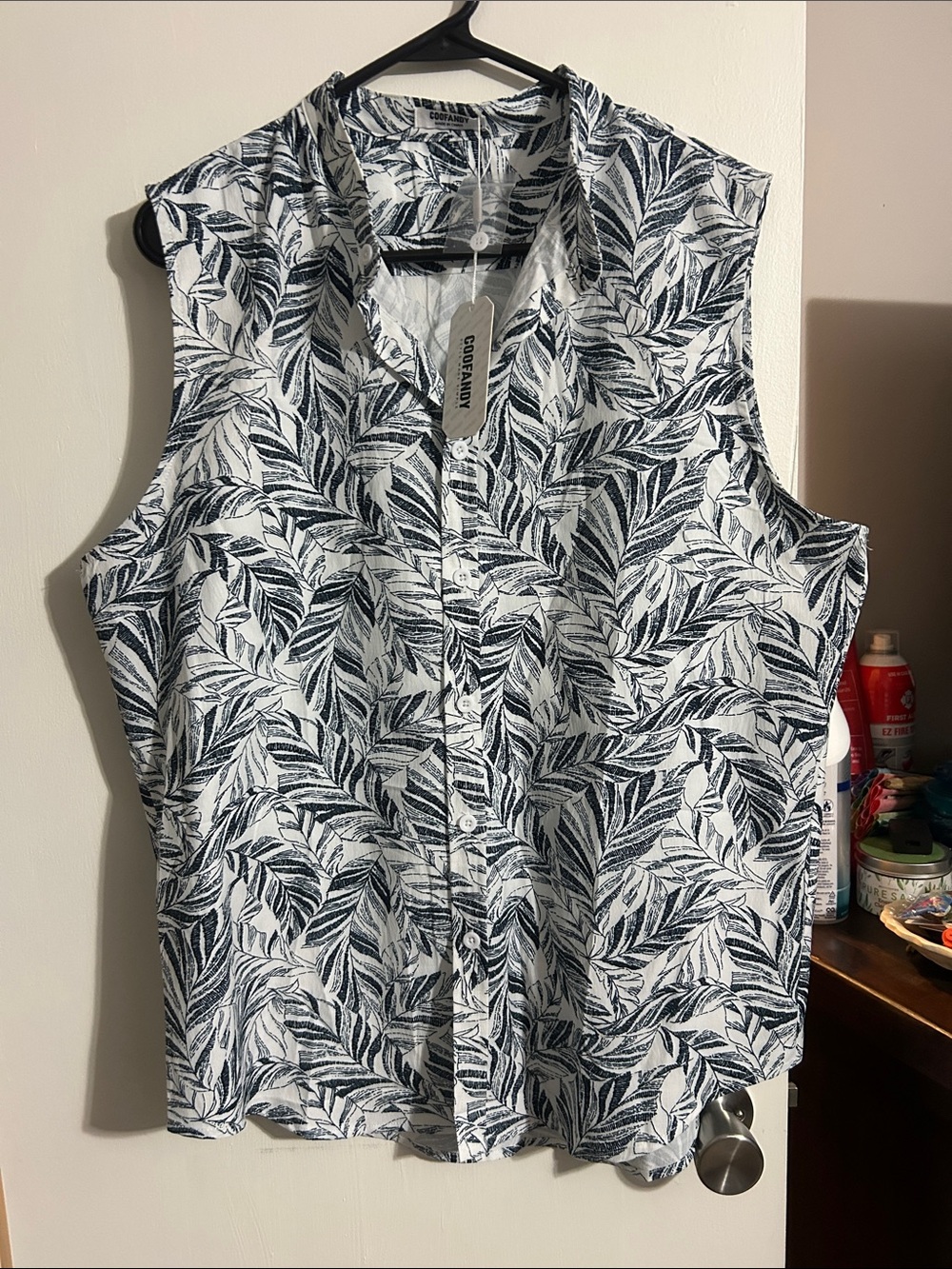 Thread & Supply Sleeveless Button-Down Leaf Print Shirt in Navy and White